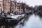 Channel in Amsterdam Netherlands Boat houses river european city landscape