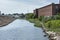 Channel curving along base of New Bedford hurricane barrier