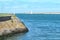 Channel of the marina of Dunkirk near the beach with sailing ships