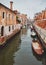 Channel in Venice with bridge boat gondola