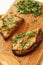 Chanterelle mushroom pate with herbs on wooden board
