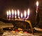 Chanukah Candles in a Modern Metal Menorah