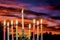 Chanukah Menorah in the Jewish festival of lights beautiful sky with cloud sunset