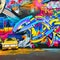 A chaotic blend of graffiti art, abstract shapes, and vibrant colors, representing urban energy and creativity4, Generative AI