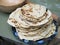 Chapati. Products made from flour. Cooked on water. On an open fire. With the addition of spices and salt. Unleavened cakes from d