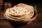 Chapati on wooden background, representing authentic Indian traditional cuisine