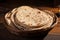 Chapati on wooden background, representing authentic Indian traditional cuisine