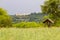 Chapel in the field in the background of the castle in Janowiec