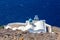 The Chapel of Panagia Theoskepasti with Aegean sea. Skaros rock, Imerovigli, Santorini island, Greece