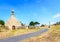 The chapel of Saint-Nicolas in Bugueles, Brittany, France, with its calvary on a sunny summer day