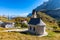 Chapel of San Maurizio at Passo Gardena, South Tyrol, Italy.  View to path to small white chapel San Maurizio and Dolomiti