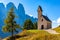 Chapel of San Maurizio at Passo Gardena, South Tyrol, Italy.  View to path to small white chapel San Maurizio and Dolomiti