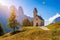 Chapel of San Maurizio at Passo Gardena, South Tyrol, Italy.  View to path to small white chapel San Maurizio and Dolomiti