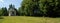 A chapel surrounded by fields and forests on a sunny summer day, Kalwaria PacÅ‚awska, Poland