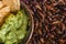 Chapulines, grasshoppers and guacamole snack traditional Mexican cuisine from Oaxaca mexico