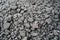 Char-coal. Pattern, heap. Pile of Bituminous Coal cinder. Stone coal Industry, business. Black coal mine close-up with soft focus