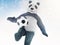 Character is covered in fur on a blue background with bokeh effect and chasing the ball. Panda footballer conducts training on sno