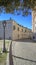 Characteristic alley of Italian village with cobblestone street and lamppost. Amelia, Umbria, Italy