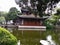 Characteristic antique gazebo and clear river trees