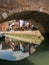 Characteristic brick pedestrian bridge that crosses one of the many navigable canals in Venice