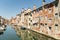 Characteristic canal in Chioggia, lagoon of Venice.