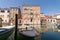 Characteristic canal in Chioggia, lagoon of Venice.