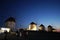 Characteristic and famous windmills at night in the small town of Chora