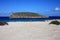 Characteristic islet of conillera bosc espartar in cala comte in ibiza in summer in front of the cliff