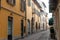 Characteristic narrow street with Christmas illuminations in Crema in the province of Cremona in Lombardy (Italy)