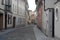 Characteristic narrow street in Crema in the province of Cremona in Lombardy (Italy)