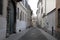 Characteristic narrow street in Crema in the province of Cremona in Lombardy (Italy)