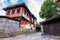 Characteristic street with cobblestones and houses in the center of koprivshtitsa Bulgaria