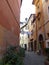Characteristic street of the district Trastevere with suspended laundry to Rome in Italy.