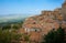 Characteristic terracotta rooftops and outlook over rural Italian landscape