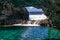 Charco azul volcanic cavern, natural volcanic ocean pool with turquoise ocean water in a volcanic cavern