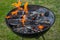 Charcoal barbecue grill, mobile brazier, burning wood