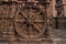 A chariot wheel carved into the wall of the 13th century Konark Sun or surya Temple, Odisha, India.