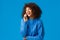 Charismatic attractive happy african-american woman answering phone, laughing happily and smiling, holding smartphone
