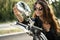 Charismatic girl with bandana on motorcycle