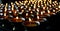 Charity. Praying candles in a monastery in Bhutan.