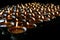 Charity. Praying candles in a monastery in Bhutan. Abstract, candlelight.