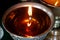 Charity. Praying candles in a temple.