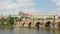 charles bridge and castle view, prague, zoom in, timelapse, 4k