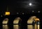 Charles bridge over the Vltava in the moonlight. Prague, a warm summer night.