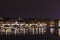 Charles Bridge in Prague in the evening with colorful lights from lanterns