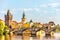 Charles Bridge, Prague towers and the National Theatre, summer d