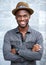 Charming african american man smiling with hat