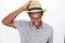 Charming african american man smiling with hat
