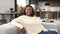 Charming African-American woman rest at home