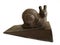 Charming antique iron snail door stop